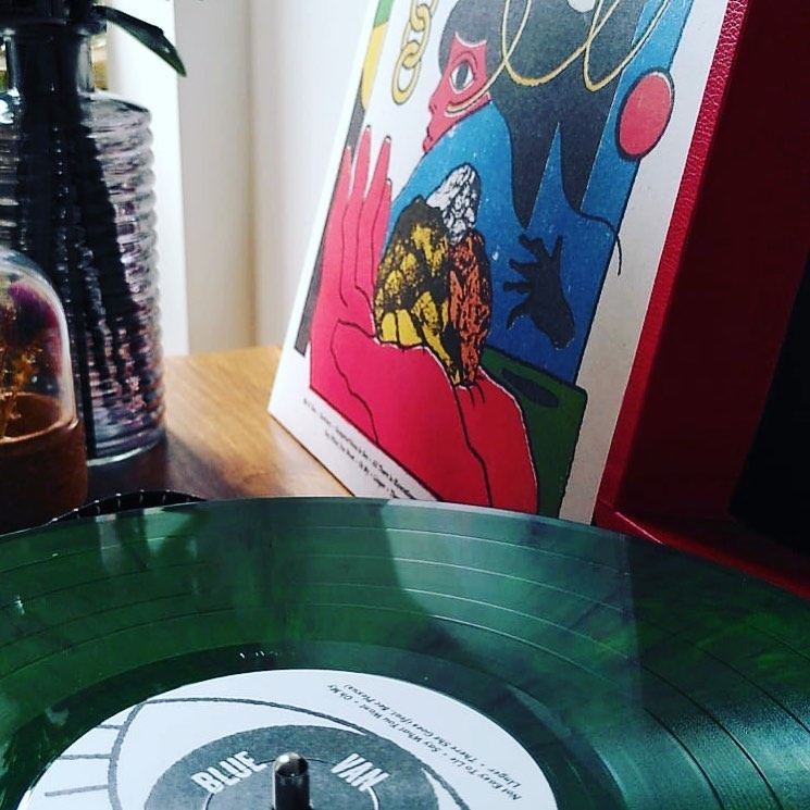 The My Blue Van record on green vinyl, sleeve leaning behind it